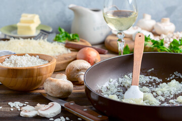 Cooking risotto with mushrooms.