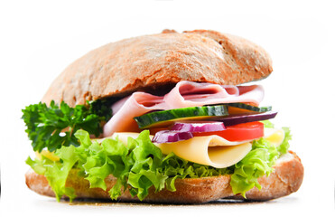 Sandwich with cheese and ham and fresh vegetables over white