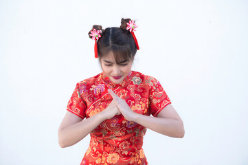 Portrait beautiful asian woman in Cheongsam dress on white background,Thailand people,Happy Chinese new year concept,Happy  asian lady in chinese traditional dress