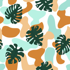 Tropical palm leaves seamless pattern. Abstract jungle with monstera leaves. Exotic colorful print. © Katerina