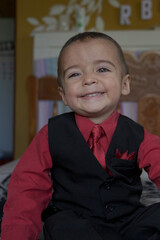 portrait of elegant little boy gesturing