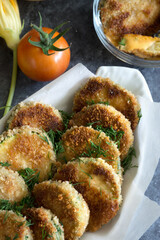 food photo. Breaded fried zucchini with vegetables. Healthy cooking, home made meal. 