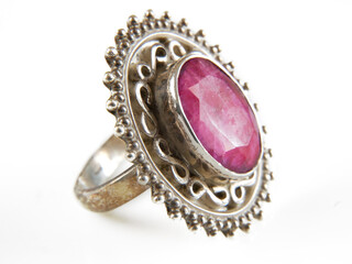 beautiful vintage ring with ruby stone lay on white background