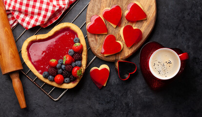Heart shaped sweet cake with berries