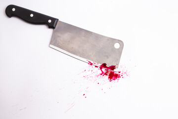 kitchen cleaver with blood splatter isolated on white background