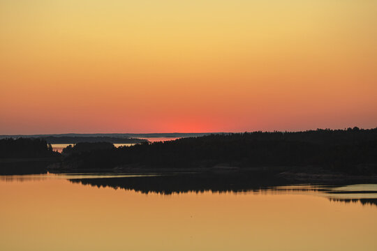 Early summer dawn over the sea. Nature of Scandinavia. islands in the sea. Finland. Turku Archipelago. © M.V.schiuma