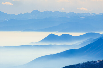 misty italian mountain panorama that looks like sea