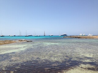 Spain, Ibiza, Platja d'en Bossa, Lively stretch of sandy beachfront backed by cafes & hotels, plus beach bars with DJs & loungers.
