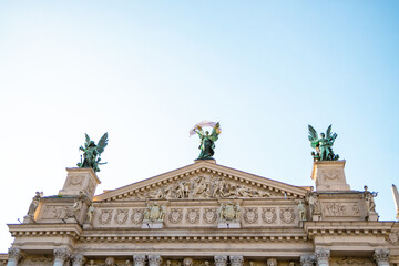 Gable of Lviv Theatre of Opera and Ballet against blue sky, horizontal image