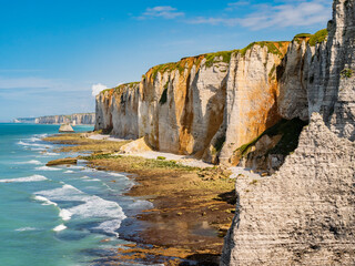 Spectacular view of Etretat coastline, vertical white cliffs in the Alabaster Coast, Normandy, France
