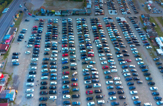 Aerial photo panorama by drone copter of the automotive market of used cars, the largest in Western Ukraine, Europe. Morning, foggy sunrise, salespeople gather for their business. Spherical panorama 3