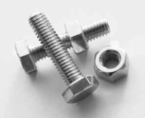 Metal nuts and bolts Isolated on white background
