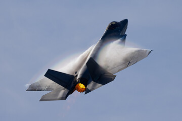 Very unusual close view of a F-35C  in a high G maneuver , with condensation clouds over the wings...