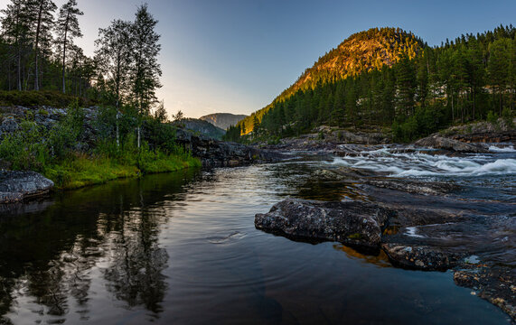 Otra river at sunset, Scandinavian landscape, Norway Bjornara Agder