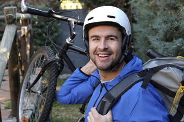 Man doing backpacking with bicycle