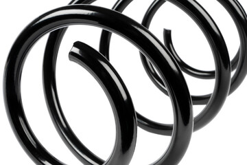 Automotive shock absorber coil spring isolated on white background. Coil spring in black steel car...
