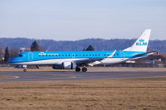 Embraer jet airplane of KLM departing Graz in Austria for a flight to Amsterdam