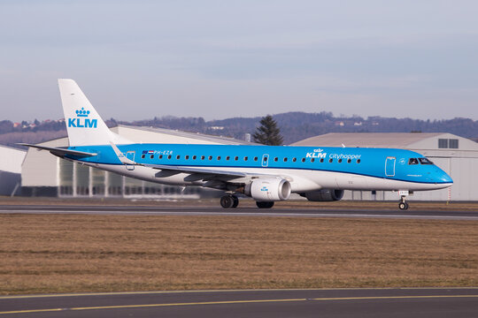 Embraer jet airplane of KLM departing Graz in Austria for a flight to Amsterdam