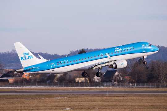Embraer jet airplane of KLM departing Graz in Austria for a flight to Amsterdam