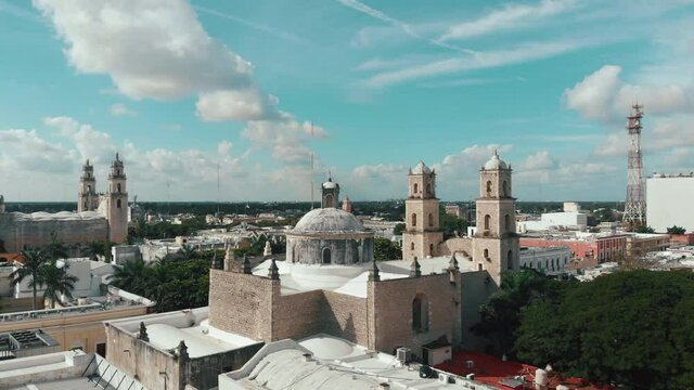 Aerial view of the Cathedral of Merida at the Grand Plaza in Merida, Yucatan, Mexico at sunset. High quality 4k footage