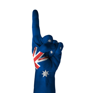 Hand pointing thumb up direction, australia painted with flag as symbol of up direction, first and number one symbol - isolated on white background