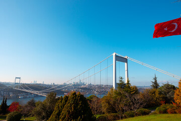 Istanbul. Fatih Sultan Mehmet Bridge and Turkish Flag.