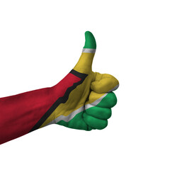 Hand making thumbs up sign, guyana painted with flag as symbol of thumbs up, like, okay, positive ...
