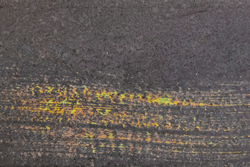 Obraz premium Abstract pattern of colored paint old design on dark background surface