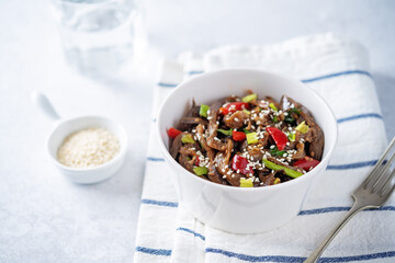 Spicy roasted eggplant with pepper in a dish