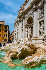 Fontana di Trevi Fountain by Nicola Salvi in front of Palazzo Poli Palace in Trevi quarter of historic Old Town city center of Rome in Italy - obrazy, fototapety, plakaty