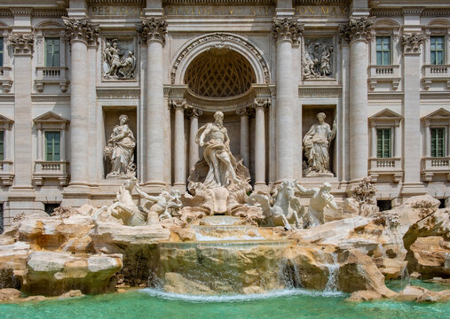 Fontana di Trevi Fountain by Nicola Salvi in front of Palazzo Poli Palace in Trevi quarter of historic Old Town city center of Rome in Italy