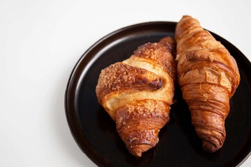 two croissants on a plate