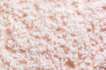 Texture background soft synthetic fluff on a pink background