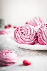 pink marshmallow on the white plate 