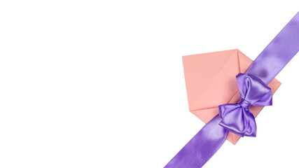 A pink envelope tied with a satin ribbon .