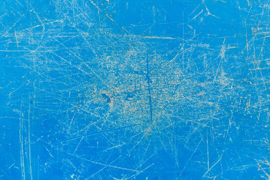 Worn plastic scratched weathered surface blue damaged cracked material abstract pattern old dirty background texture rough