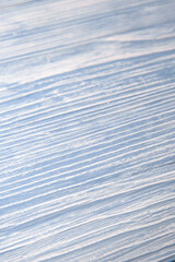 Background from blue boards with white scuffs for design, menus, advertising booklets. Beautiful texture, artistic plaster. Free space for text.