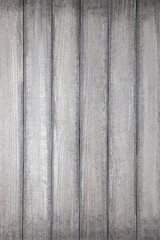 Background from planks of light gray color for design, menus, advertising booklets. Beautiful texture, artistic plaster. Free space for text.