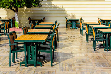 Chairs and tables in a cozy street cafe
