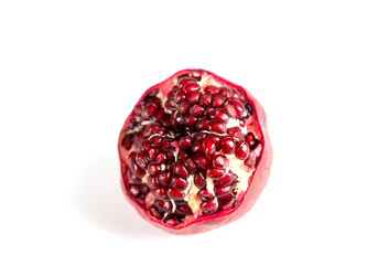 red ripe pomegranate on white background