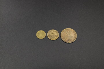Vintage Soviet coins on black background