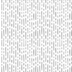 Behang Verticale korte en lange lijnen hand getekende naadloze patroon. Zwart-wit eenvoudig vectorpatroon met abstracte dunne streepjes en lijnen. Horizontale gestippelde strepen. Grunge dash vlekken achtergrond © Анастасия Гевко