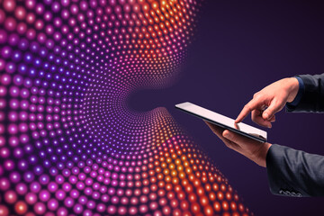 Close up of businessman hand holding and pointing at smartphone on creative big data flow...