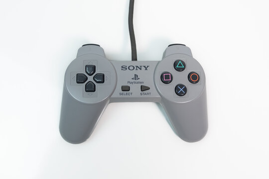 Sony PlayStation 1 controller for original PS1 console. Top down on white background.