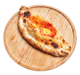 Single calzone italian pizza on wooden plate isolated over white background