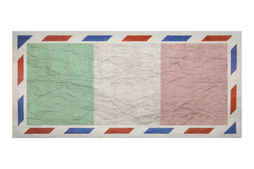 Fototapeta na wymiar Postal envelope. Envelope with the image flag of Italy. Italian flag. Faded crumpled envelope with no postmark. Copy space. Blank mock up.