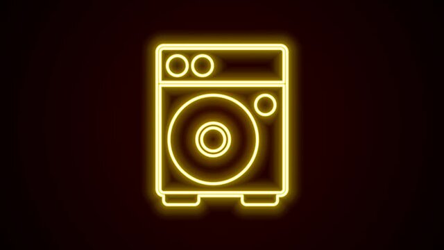 Glowing neon line Guitar amplifier icon isolated on black background. Musical instrument. 4K Video motion graphic animation
