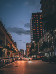 view of the city street cars people buildings bridge sky Brickell MIAMI FLORIDA  