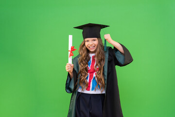 A graduate in a ceremonial robe and a master's cap is glad to receive a certificate. school education and passing exams learning English.