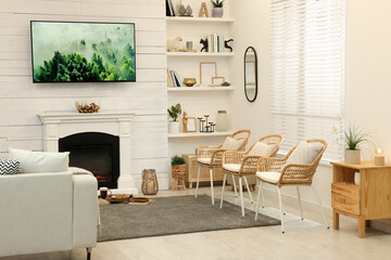 Cozy living room interior with decorative fireplace